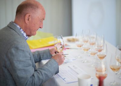 A person drinking wine